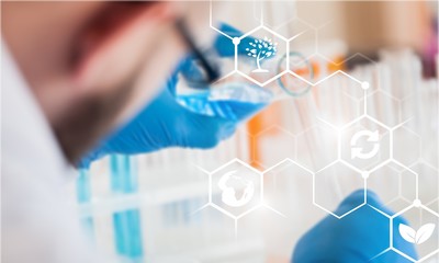 Scientist working in laboratory with test tubes , laboratory equipment