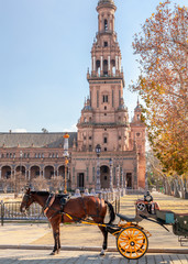 Naklejka na ściany i meble Horse and carriage in Plaza de Espana, Seville