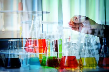 Chemical tube set development and pharmacy in laboratory  with multicolored substances in laboratory - Image