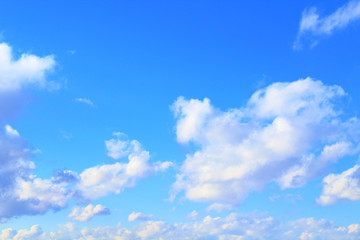Beautiful blue sky and white cumulus clouds. Background. Landscape.