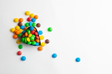 A bowl of multicolor chocolate candies