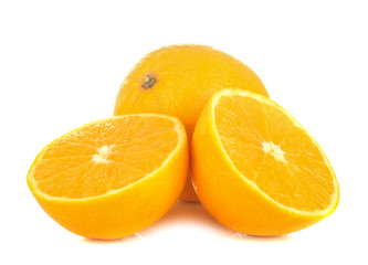 Fresh oranges and sliced orange on a white isolated background. close-up