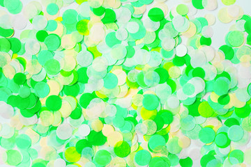 Close view of colorful bright confetti textured background.
