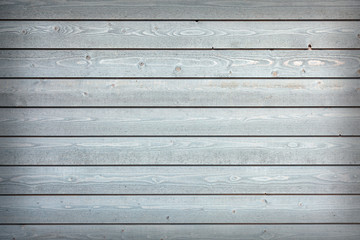 Fototapeta premium horizontal wooden planks with grey paint on fence