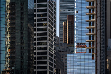 Fototapeta na wymiar Close-up view of modern skyscrapers in Financial District Lower Manhattan New York City