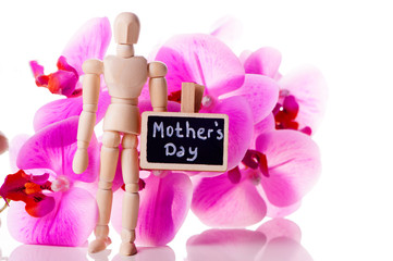 Wooden mannequin with blackboard and flowers - motherìs day