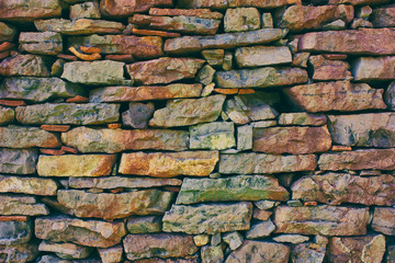 Old multicolored stone wall