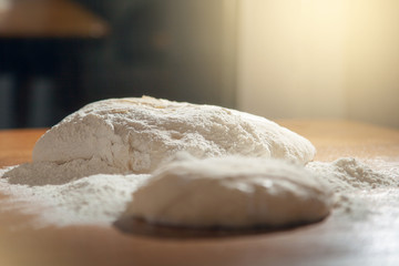  Cooking in the kitchen. A dish of flour. Kneading the dough.