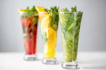 Various non-alcoholic cocktails with fruit and mint. Concept for drinks, summer, heat, alcohol, party and bar