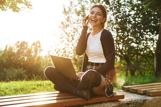 Cheerful teenage girl wearing uniform