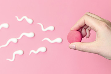 Sperm swimming toward egg concept.