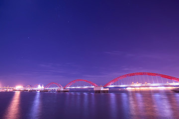 The freighter dock on the sea bridge at night