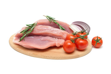 piece of meat, tomato, onion and rosemary on a white background