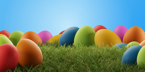Fototapeta na wymiar Colorful Easter eggs for Easter in the grass of a meadow 3d-illustration
