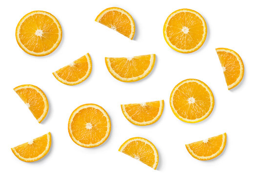 Orange slices isolated on white background. Top view.