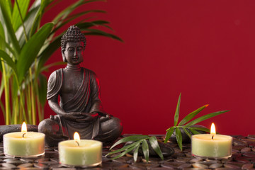 Buddha statue and candles