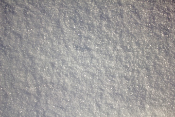 white snow surface with snowflakes closeup. natural texture