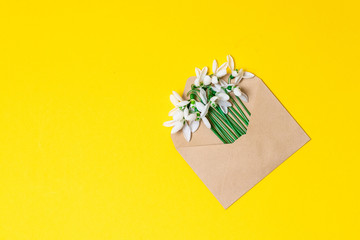 Spring concept banner. envelope with spring flowers on the background with place for text