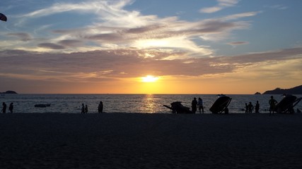 Naklejka na ściany i meble sunset on the beach 7