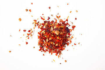A mixture of spices. Paprika. A sprinkle of spices. Isolated image