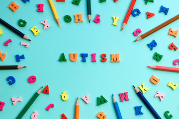 AUTISM colorful word from color wooden letters, World Autism Awareness Day, April Autism awareness month