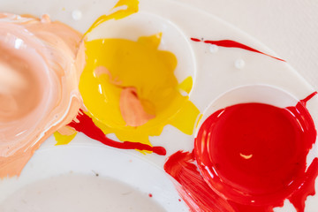 Close up of different color oil paint, Patterns or backgrounds of various colors, colors on the fabric.