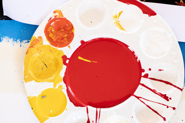 Close up of different color oil paint, Patterns or backgrounds of various colors, colors on the fabric.