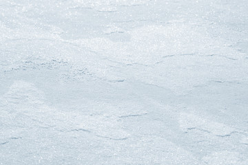 Fresh snow background texture. Winter background with snowflakes and snow mounds. Snow lumps.