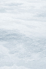 Fresh snow background texture. Winter background with snowflakes and snow mounds. Snow lumps.