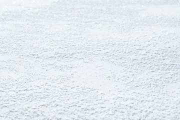 Fresh snow background texture. Winter background with snowflakes and snow mounds. Snow lumps.