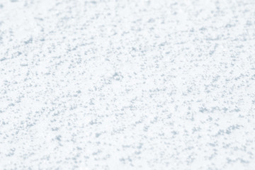 Fresh snow background texture. Winter background with snowflakes and snow mounds. Snow lumps.