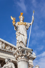 Fototapeta na wymiar Athena Statue in front of the Parliament in Vienna Austria