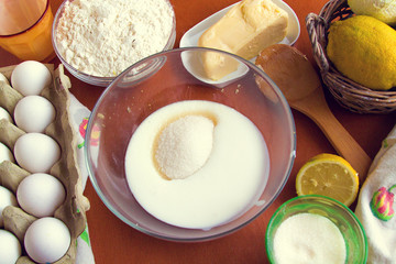 ingredients for homemade lemon cake, which are on the table