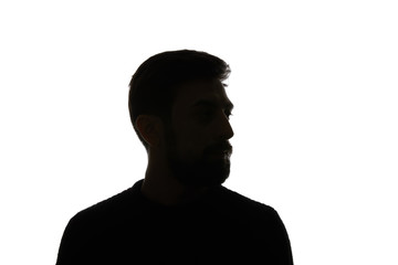Silhouette of man looking away isolated on white