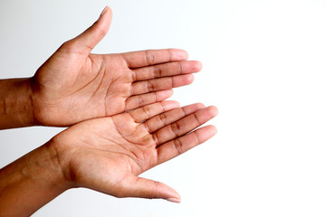 Black African hands out reaching, begging, showing with palms up