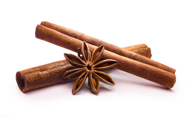 cinnamon stick and star anise on white background