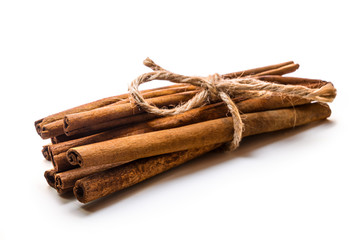 Cinnamon sticks isolated on white background