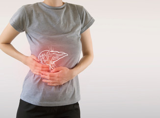 Digital composite of highlighted painful  liver of woman