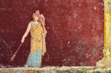 Figure of a woman painted in a Fresco in a Domus of Pompeii, Italy - 257689917
