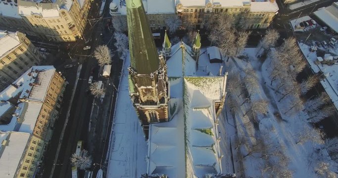 Footage of big beautiful city full of houses and landmarks. Church of St. Olga and Elizabeth. Calling card of Lviv. Europe. High temple. Drone shot.