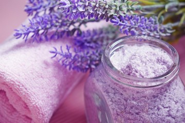 Bath salt with the scent of lavender on a pink background.