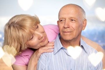 Portrait of happy senior couple smiling  in park