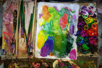 artist paints oil palette