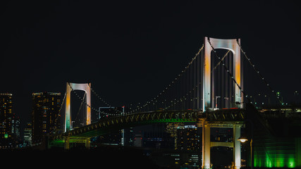 Romactic city night view,Rainbow bridge and Tokyo Tower landmark ,Odaiba,Japan.