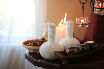 Beautiful spa composition on massage table in wellness center
