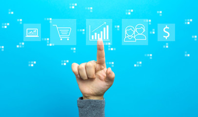 Marketing concept with hand on a blue background
