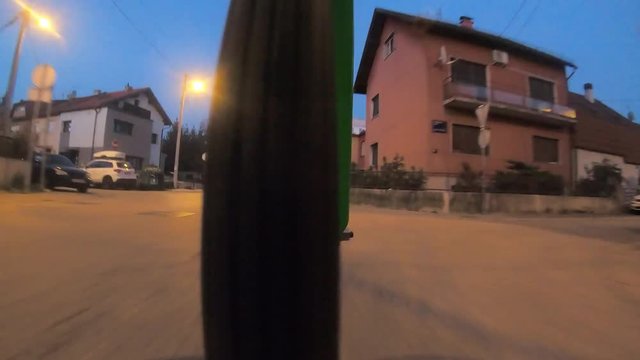 957_01 Bicycle Ride Wheel View At Night Through City Time Lapse