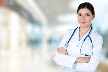 Young man doctor holding stethoscope