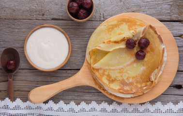 Tasty crepes with caviar. French crepes, russian or ukrainian on white background. Maslenitsa...