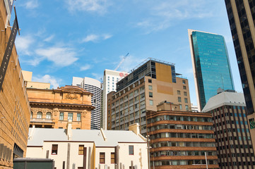 SYDNEY - OCTOBER 2015: City skyline on a sunny day. The city attracts 20 million people annually